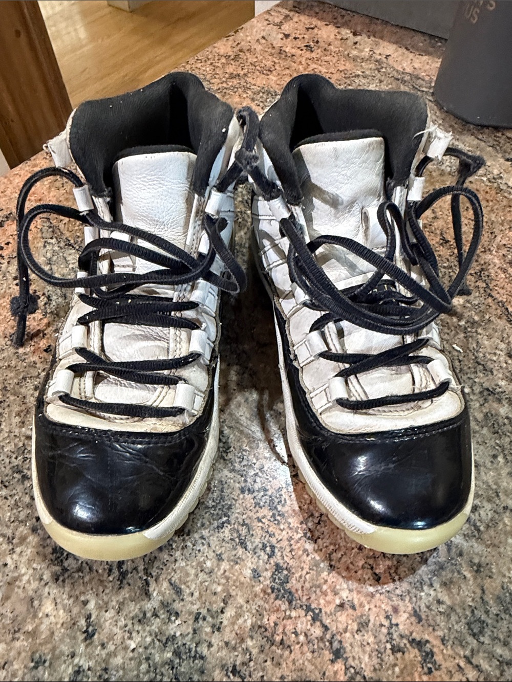 Jordan 11s size 1Y Black and White High-Top Sneakers